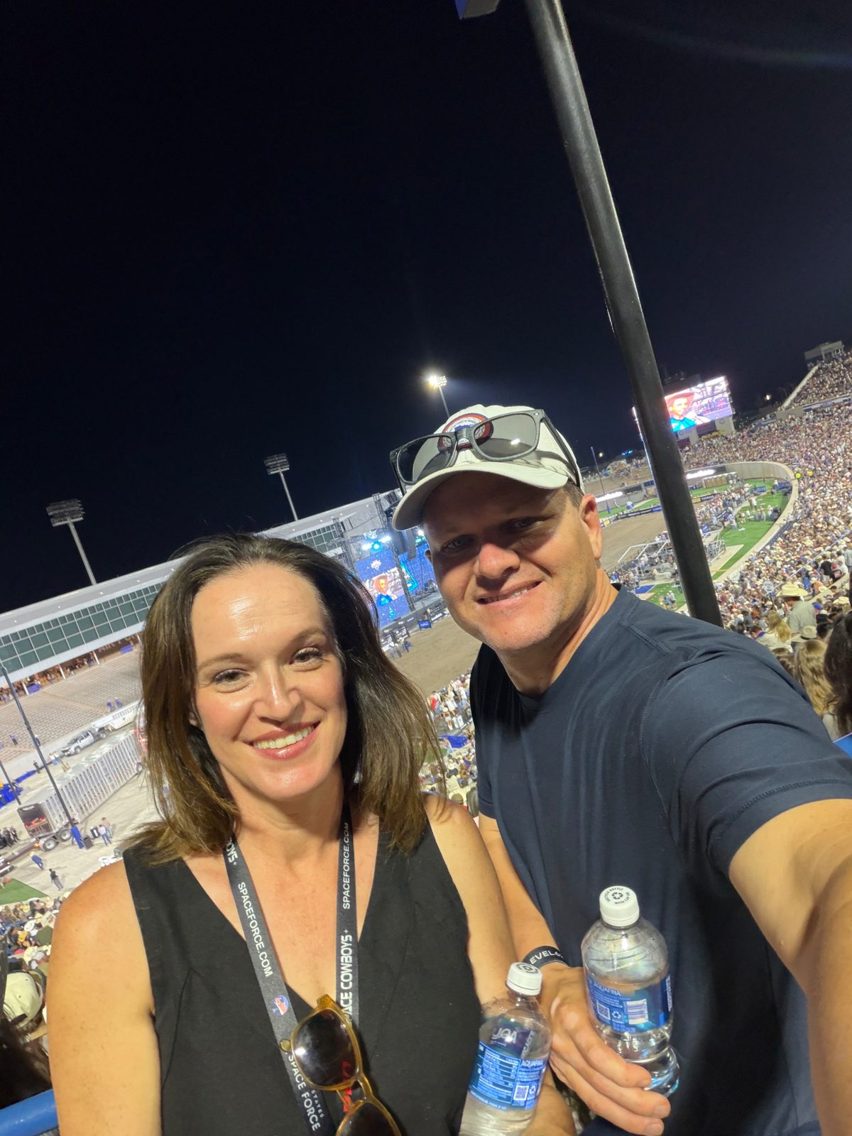 Julie and Jay at an evening stadium event