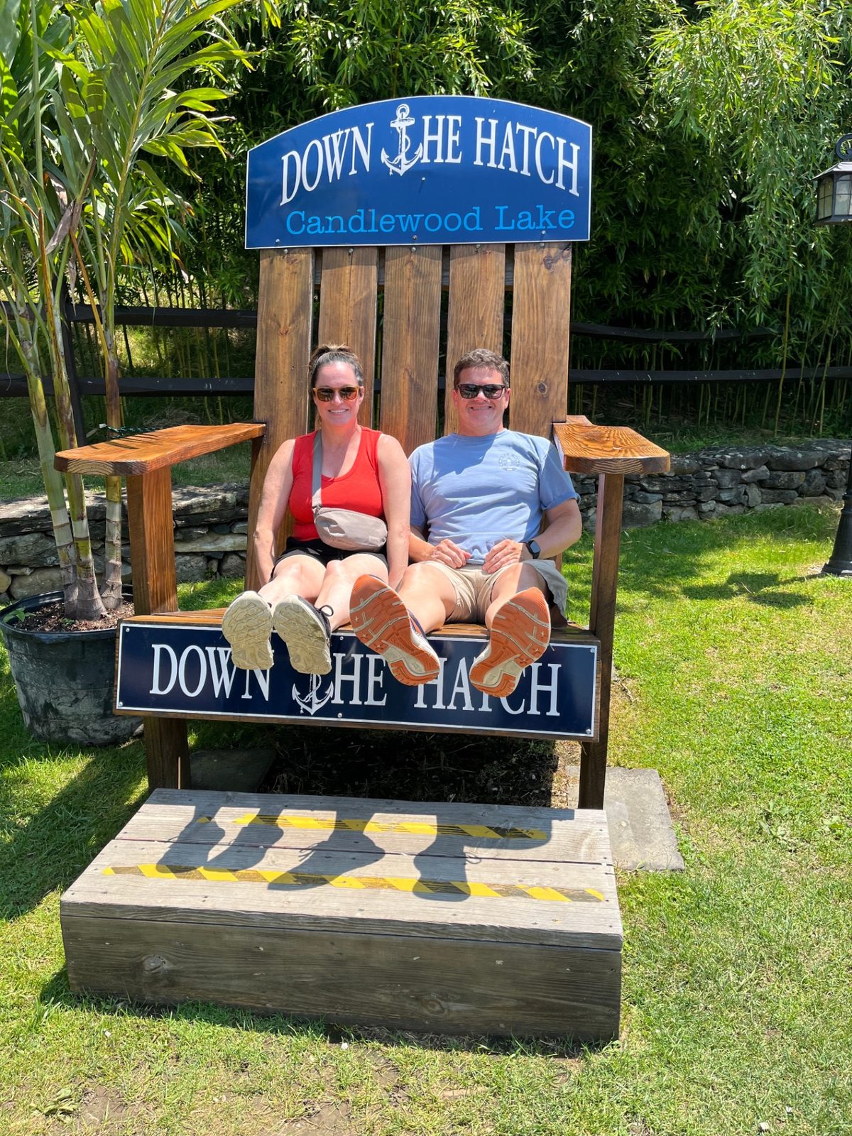 Julie and Jay in the oversized Down the Hatch chair at Candlewood Lake