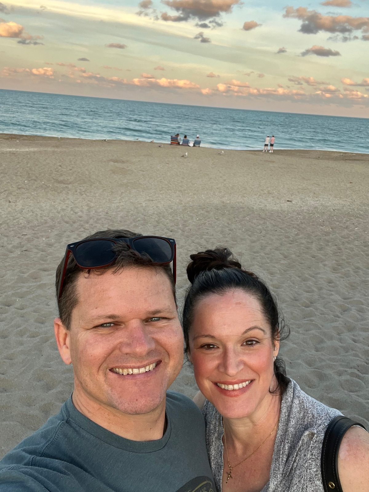 Julie and Jay at the beach at sunset