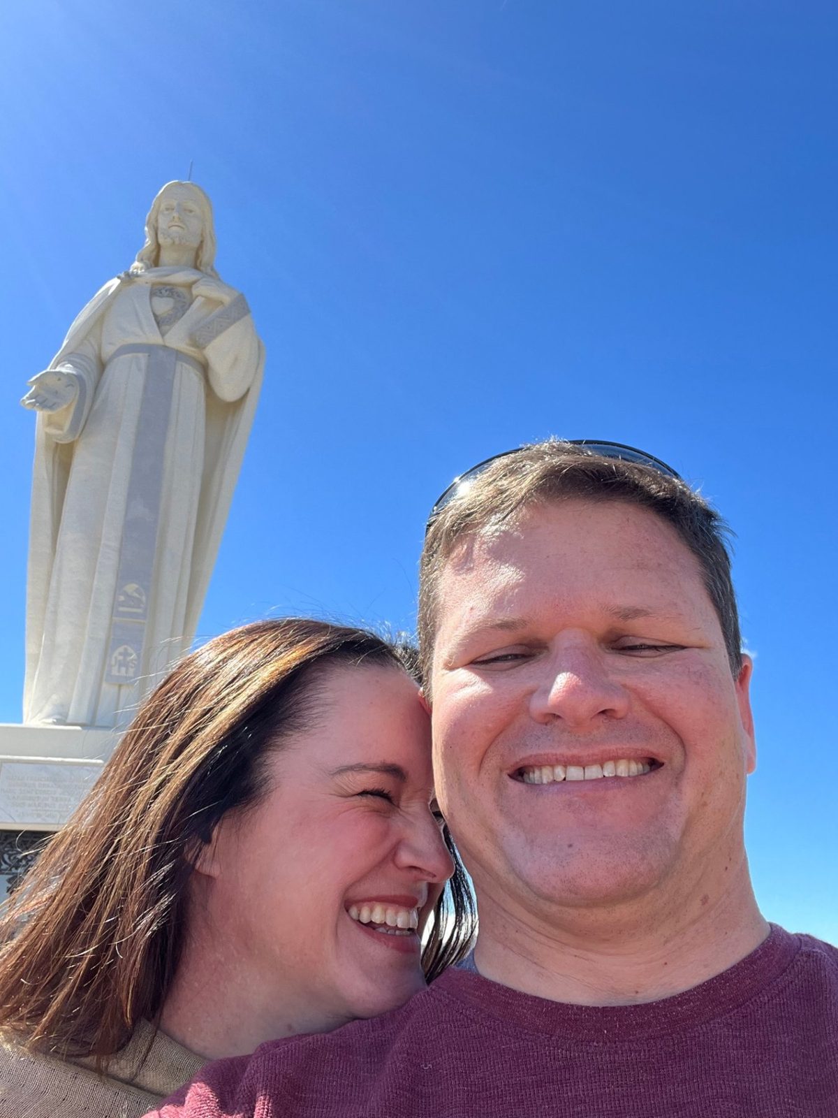 Julie and Jay smiling together outdoors