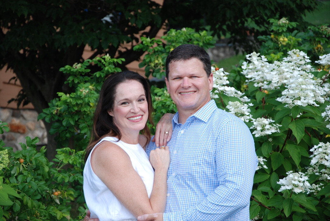 Julie and Jay among white hydrangeas